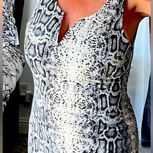 Haute Monde Dress.  This body con style dress is sure to impress!